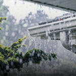 rain pouring over a house